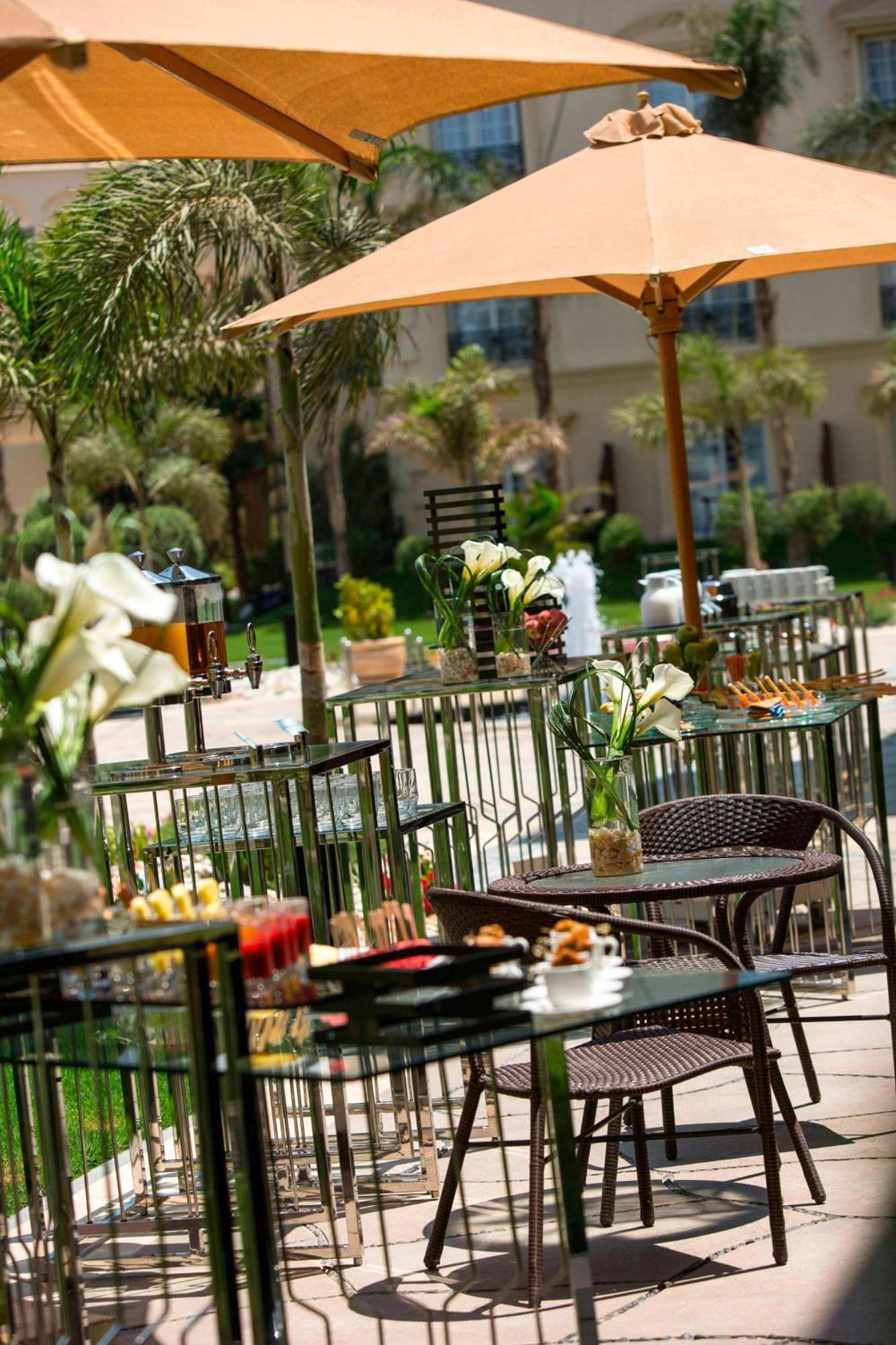 Renaissance Cairo Mirage City Hotel Exterior photo The hotel's outdoor café